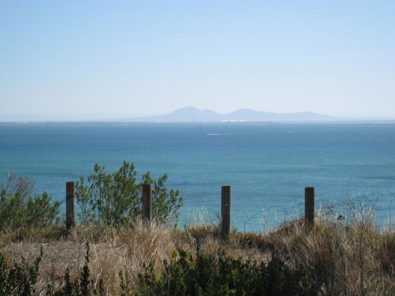 Clifton Springs - The Dell Picnic Area, northern end of Springs Street - View north-west across bay towards You Yangs from top of cliffs at western side of picnic area