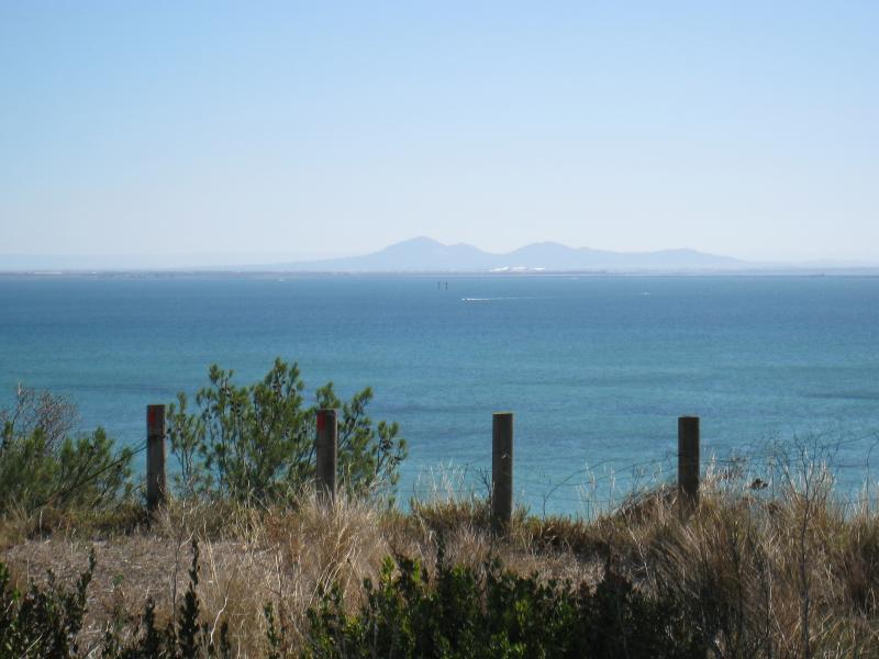 Clifton Springs - The Dell Picnic Area, northern end of Springs Street: View north-west across bay towards You Yangs from top of cliffs at western side of picnic area