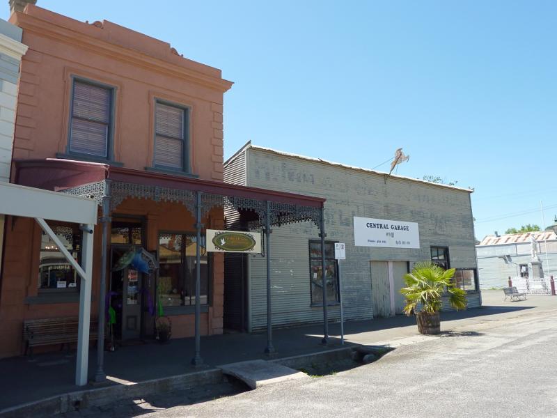 Clunes - Shops and commercial centre, Fraser Street between Service Street and Templeton Street: Shops and Central Garage, north side of Fraser St at Service St