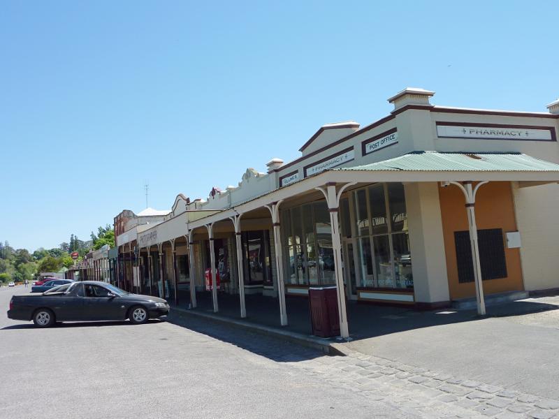 Clunes - Shops and commercial centre, Fraser Street between Service Street and Templeton Street: Post office and pharmacy, view west along Fraser St