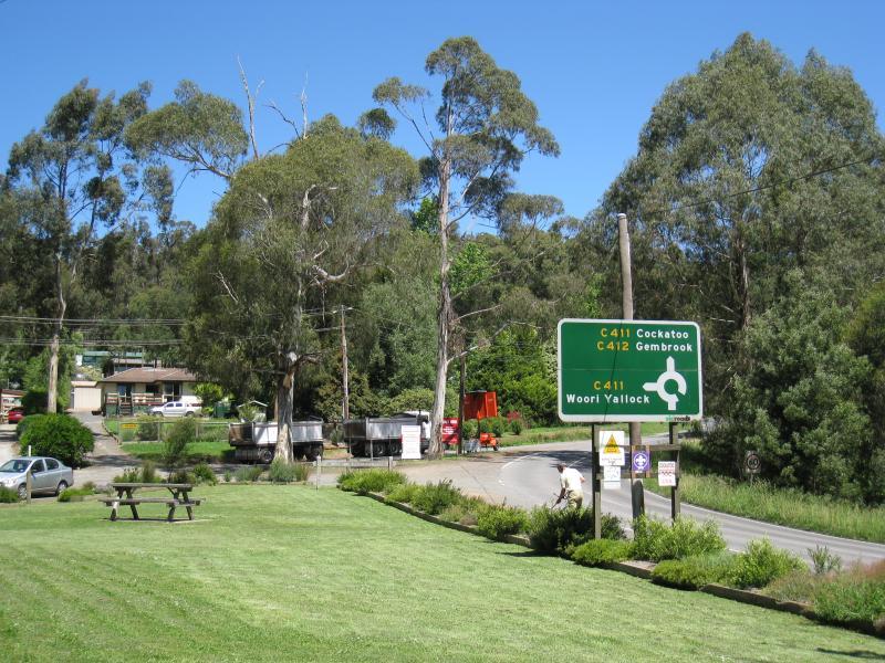 Cockatoo - Belgrave Road, north of town centre: View east along Belgrave Rd through park beside Cockatoo Creek