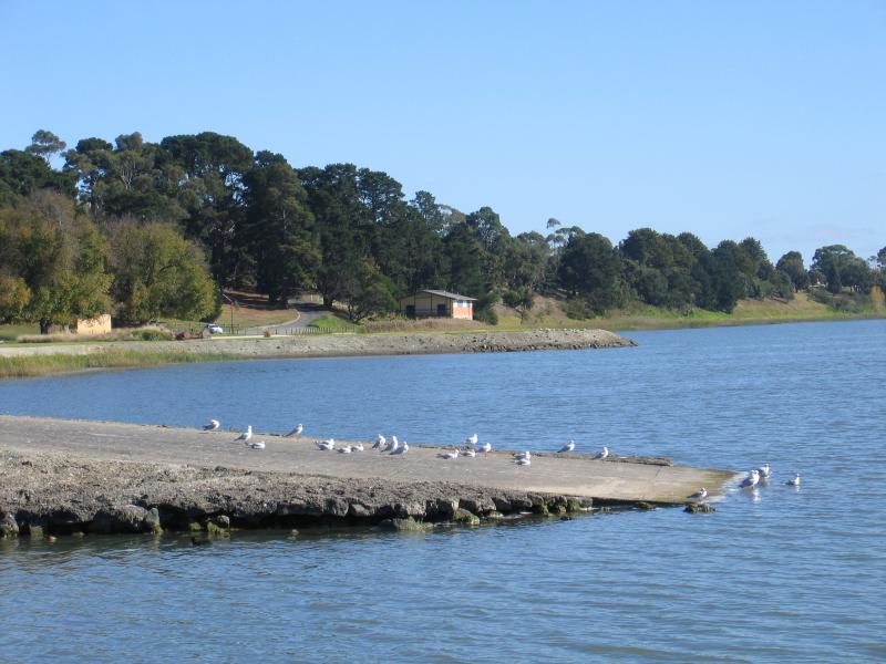 Colac - Lake Colac near Botanic Gardens: View west along foreshore from jetty towards boat ramp