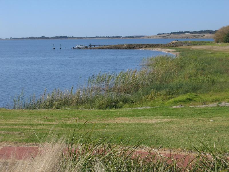 Colac - Lake Colac near Botanic Gardens: View east along foreshore towards boat ramp and jetty