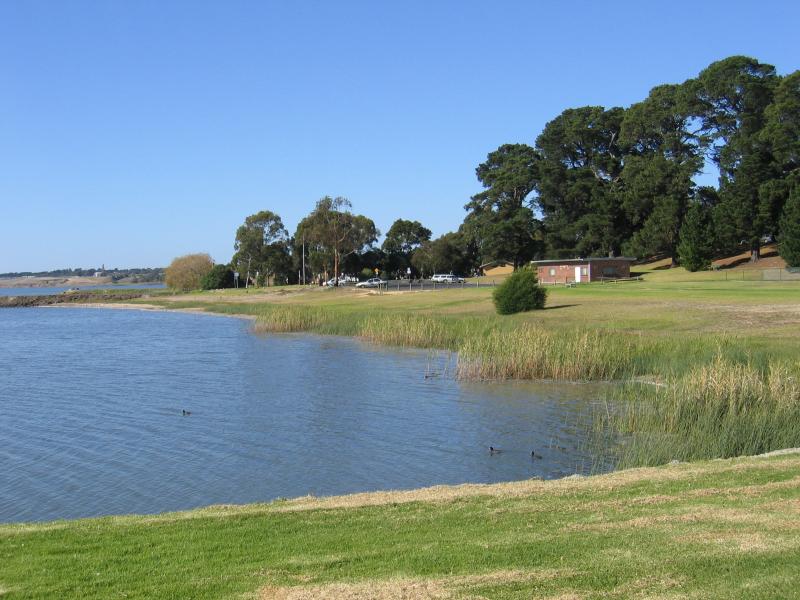 Colac - Lake Colac near Botanic Gardens: View east along foreshore towards car park at boat ramp