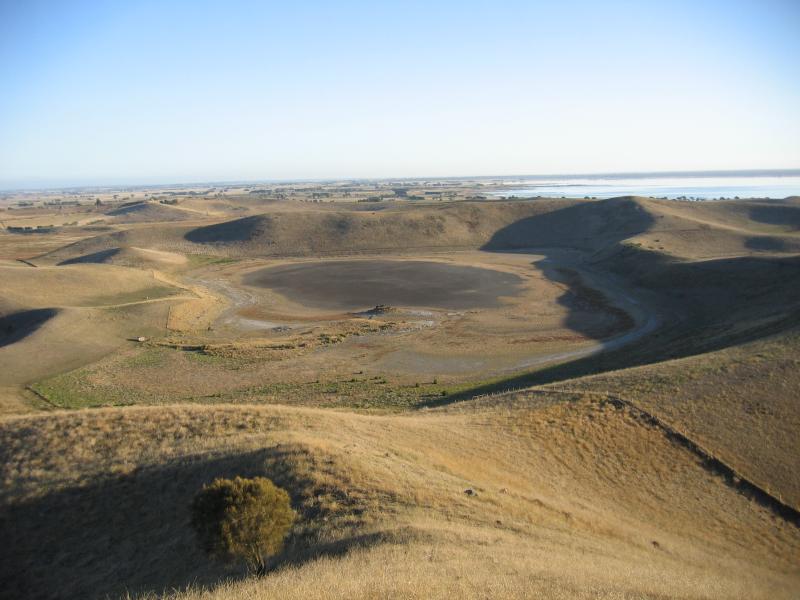 Colac - Red Rock main lookout: South-westerly view across volcanic landscape towards Lake Corangamite from car park