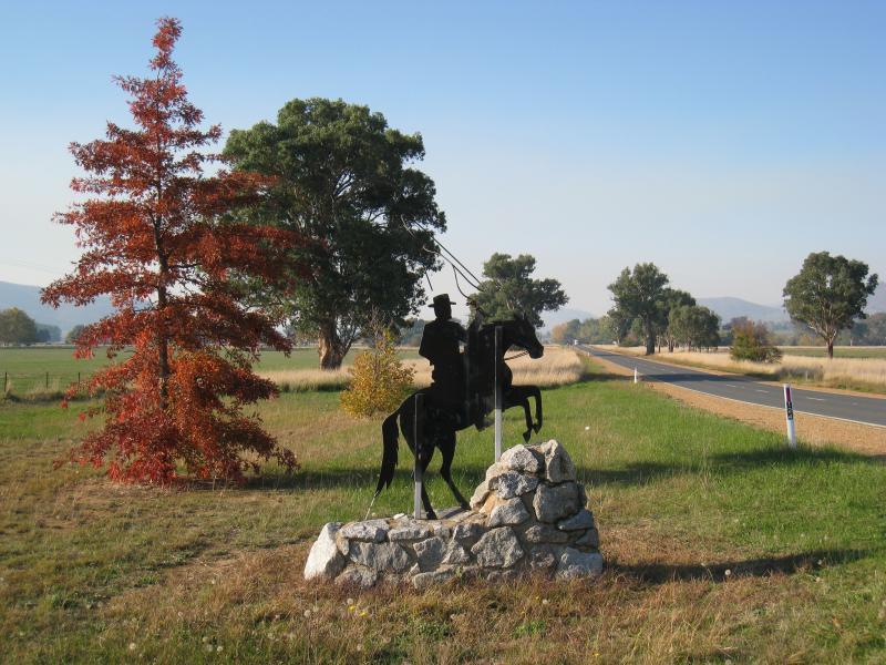 Corryong - Towong Road and Murray Valley Highway, east end of Corryong: Stockman monument, view north-east along Murray Valley Hwy, east of town