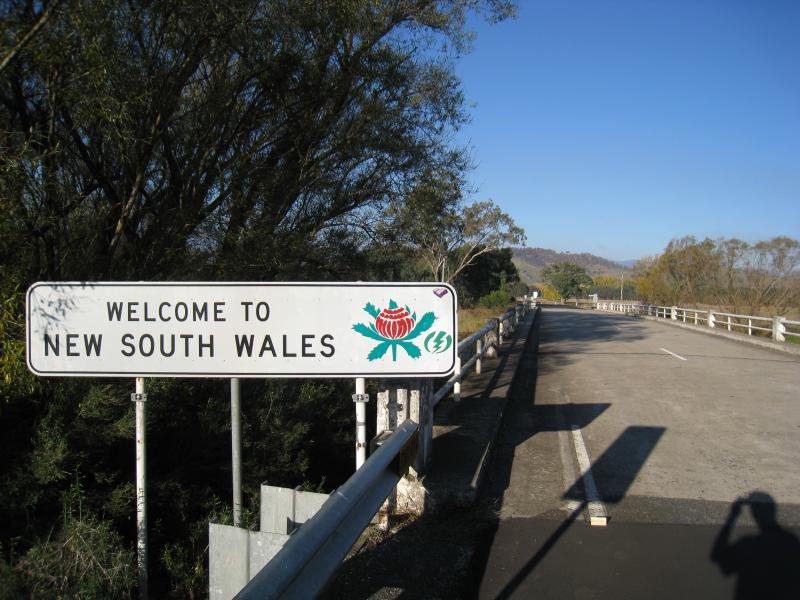 Corryong - Murray Valley Highway at Murray River (state border with N.S.W.): New South Wales state border sign, east along bridge