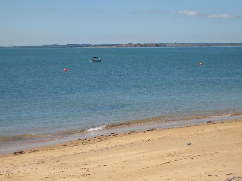Cowes - Boat ramp and beach at end of Anderson Road: View across beach towards French Island
