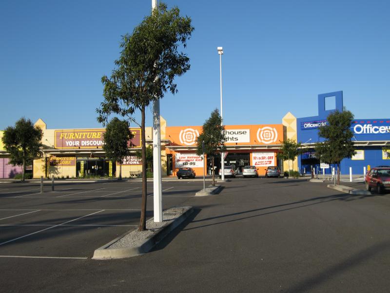 Cranbourne - Cranbourne Homemaker Centre, corner South Gippsland Highway and Thompsons Road: View east through car park towards showroom factories