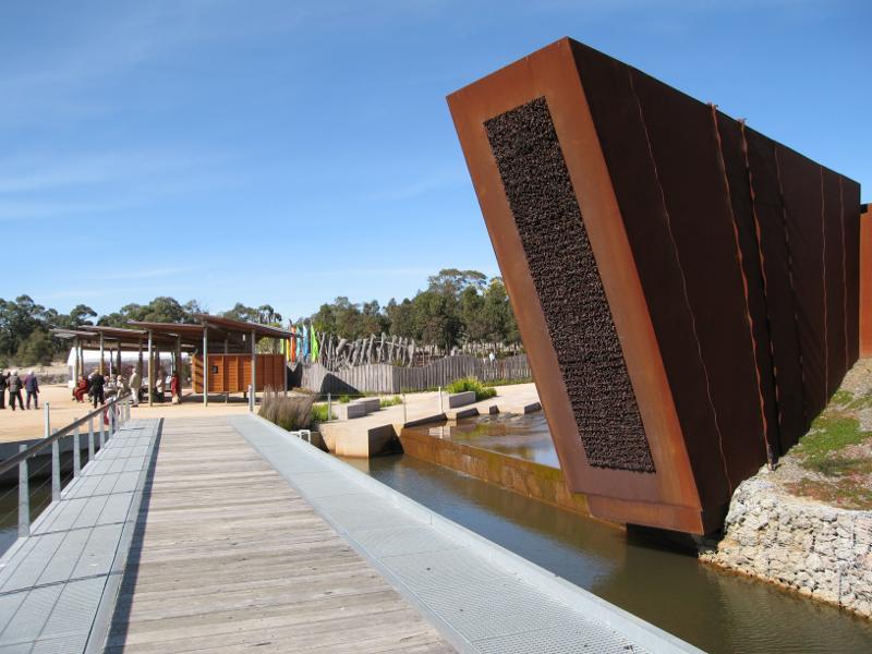 Cranbourne - Australian Garden at Royal Botanic Gardens Cranbourne: View east along Waterhole Bridge towards Escarpment Wall Sculpture and Rock Pavilion