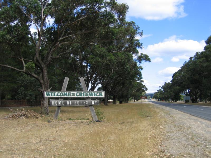 Creswick - Around Creswick and outskirts: Welcome to Creswick home of forestry sign, view south along Clunes-Creswick Road near Johns Rd