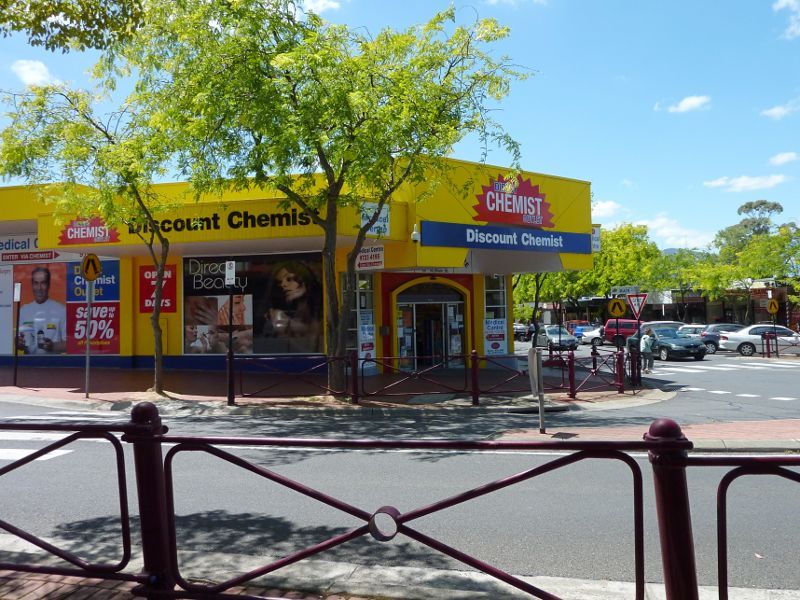 Croydon - Shops and commercial centre, Main Street, Hewish Road and Lacey Street: View east across Main St at Hewish Rd