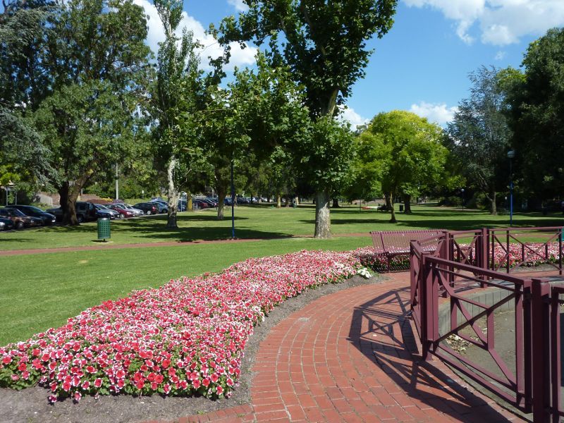 Dandenong - Dandenong Park, Foster Street and Pultney Street: South-easterly view through park from Rotary Waterwheel