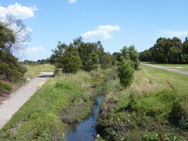 Dandenong - Falkiner Reserve between Heatherton Road and Falkiner Crescent: Dandenong Creek Trail beside drain at Heatherton Rd