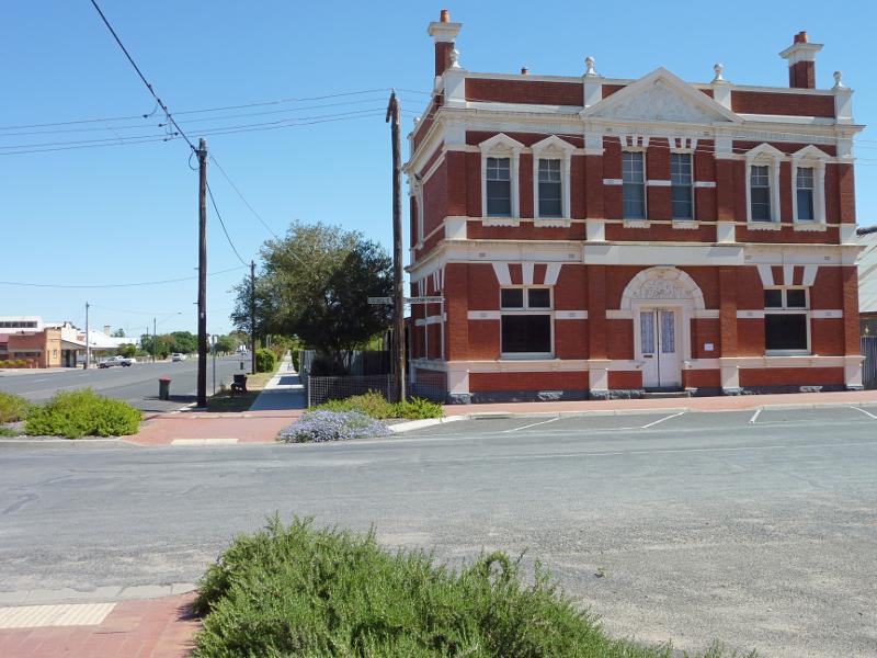 Dimboola - Shops bounded by Lloyd Street, Lochiel Street, Victoria Street and Wimmera Street - View north-west along Lloyd St at Lochiel St towards old National Bank