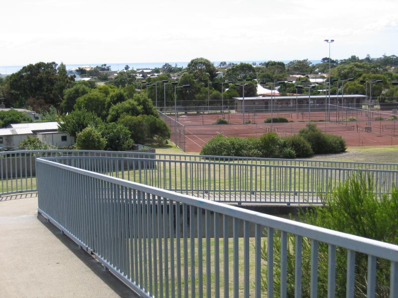 Dromana - Mornington Peninsula Freeway: View north towards tennis courts from footbridge at end of Pier St