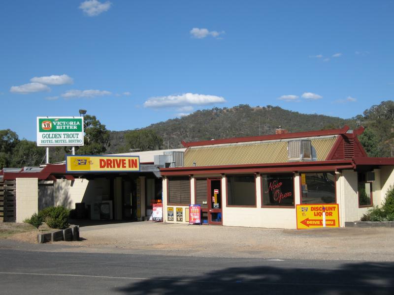 Eildon - Lions Riverside Park along Goulburn River at Riverside Drive: Golden Trout Hotel viewed from Riverside Dr opposite Centre Av