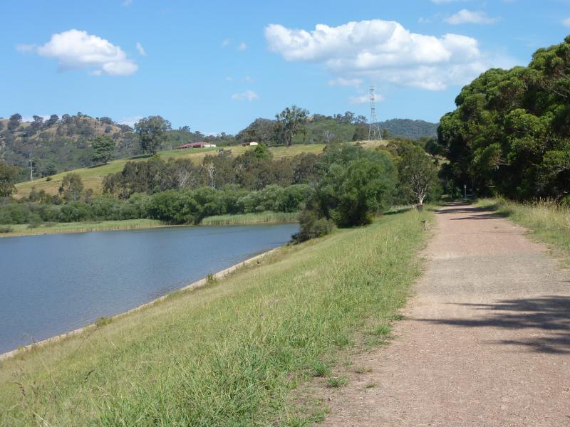 Eildon - Goulburn River at the weir and surrounding parkland, south-west of Eildon town centre: View south-east along walking track and side of river