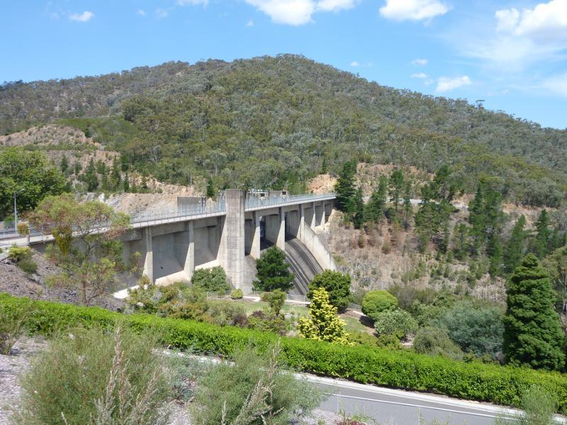 Eildon - Eastern end of Lake Eildon dam wall and lookout - View east towards weir at spillway from lookout