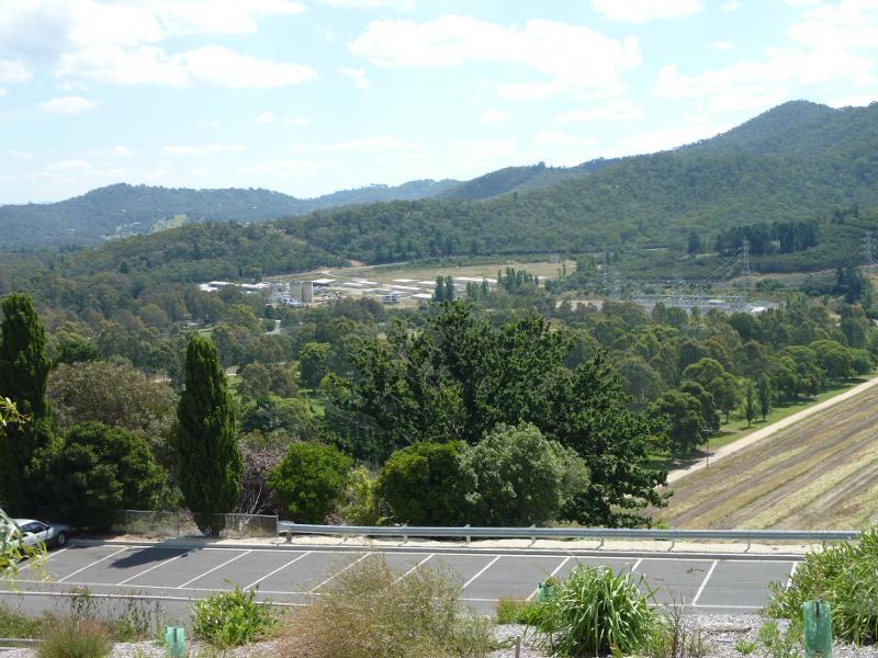 Eildon - Eastern end of Lake Eildon dam wall and lookout: Westerly view from lookout towards power station