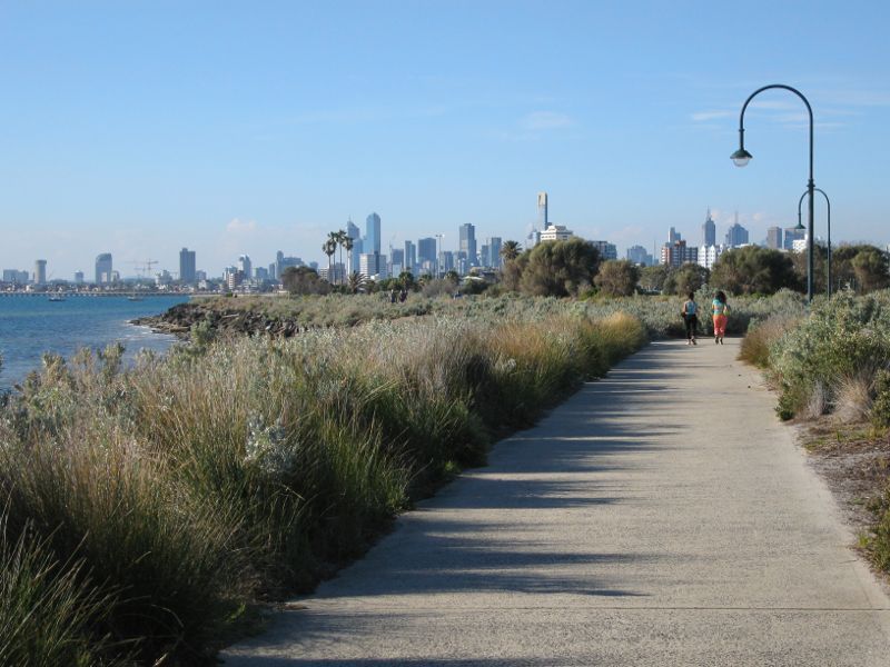 Elwood - Coastal reserve around Elwood Canal: View north along coastal pathway south of canal towards city skyline