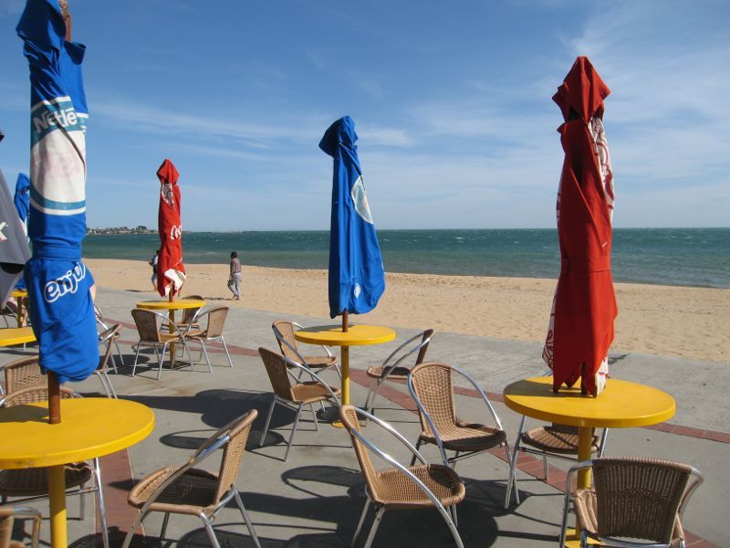 Elwood - Elwood Beach and coastline between Point Ormond and diversion drain: Tables at kiosk overlooking beach