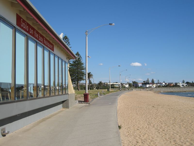 Elwood - Elwood Beach and coastline between Point Ormond and diversion drain - View south-east along beach and foreshore at Sails By The Bay restaurant
