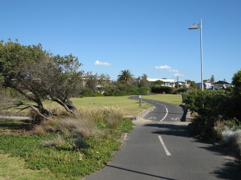 Elwood - Beach and coastline at diversion drain at end of Head Street: Southerly view along bicycle path through foreshore reserve south of diversion drain