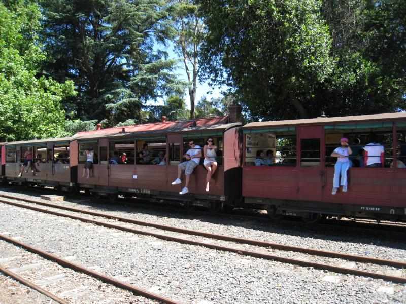 Emerald - Puffing Billy station in Emerald town centre: Travellers in carriages of Puffing Billy stopped at station