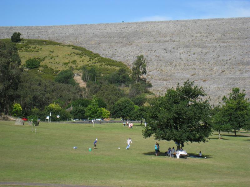 Emerald - Cardinia Reservoir Park: View north-east across lawns towards dam wall
