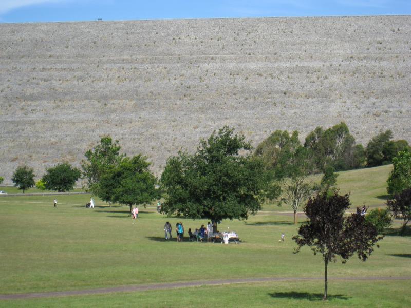 Emerald - Cardinia Reservoir Park: View east across lawns to dam wall