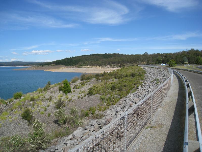 Emerald - Cardinia Reservoir Park: View south-east along dam wall towards spillway