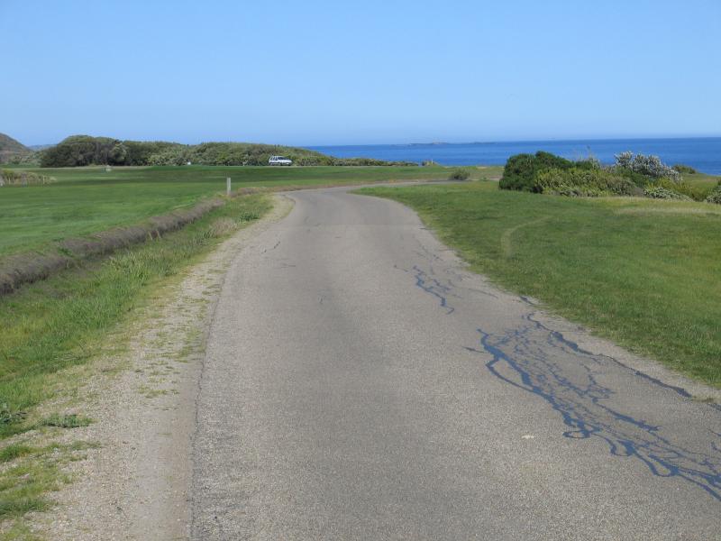Flinders - Coast along Bass Strait and Ocean Beach: View east along Golf Links Rd above Mushroom Reef