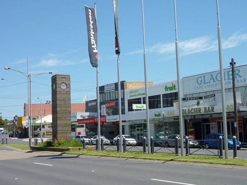 Frankston - Shops and commercial centre between Nepean Highway and Young Street: View south along Nepean Hwy at clocktower towards Playne St