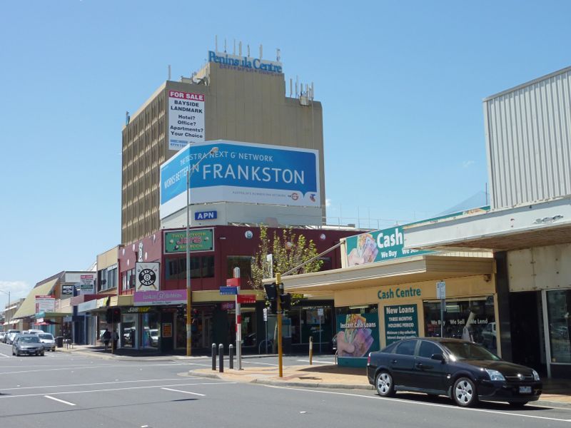 Frankston - Shops and commercial centre between Nepean Highway and Young Street - View north along Nepean Hwy at Wells St