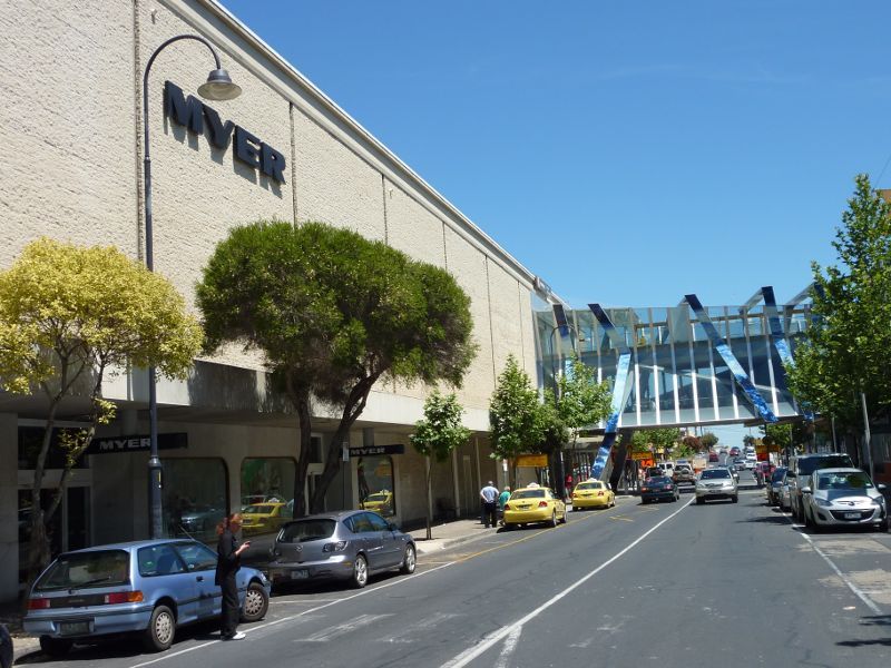 Frankston - Shops and commercial centre between Nepean Highway and Young Street - View west along Beach St towards walkway overpass at Myer store