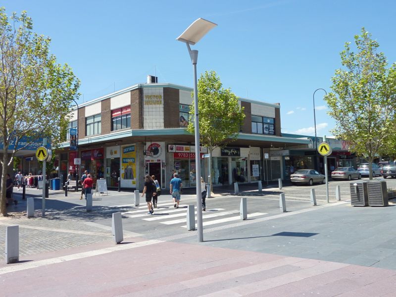 Frankston - Shops and commercial centre between Nepean Highway and Young Street: View north across Wells St at Shannon St Mall