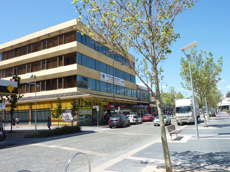 Frankston - Shops and commercial centre between Nepean Highway and Young Street - View east along Wells St at White St Mall