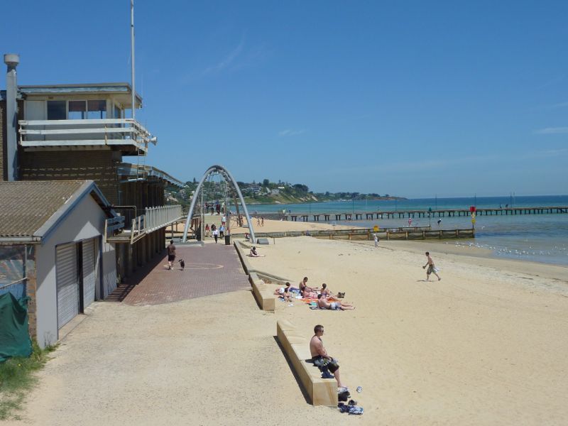 Frankston - Frankston Waterfront and Frankston Pier, Pier Promenade: View south along beach towards Frankston Yacht Club and Landmark Bridge