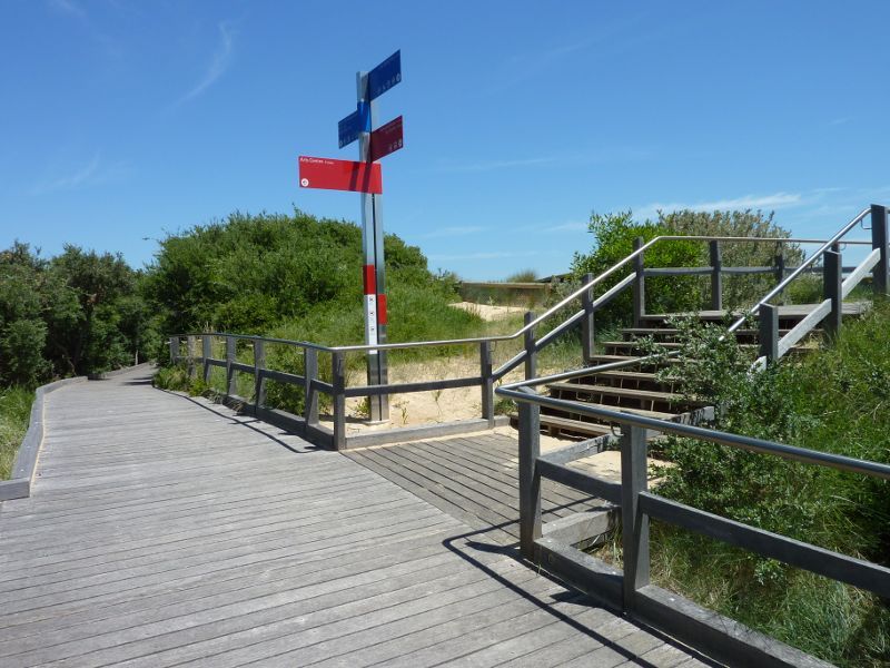 Frankston - Beach between Frankston Life Saving Club and Kananook Creek: Stairway to beach viewing platform from boardwalk through Kananook Creek Reserve