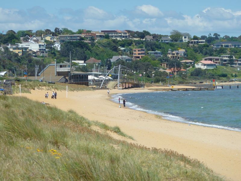 Frankston - Beach at end of Beach Street: View across beach towards Frankston Yacht Club and Landmark Bridge