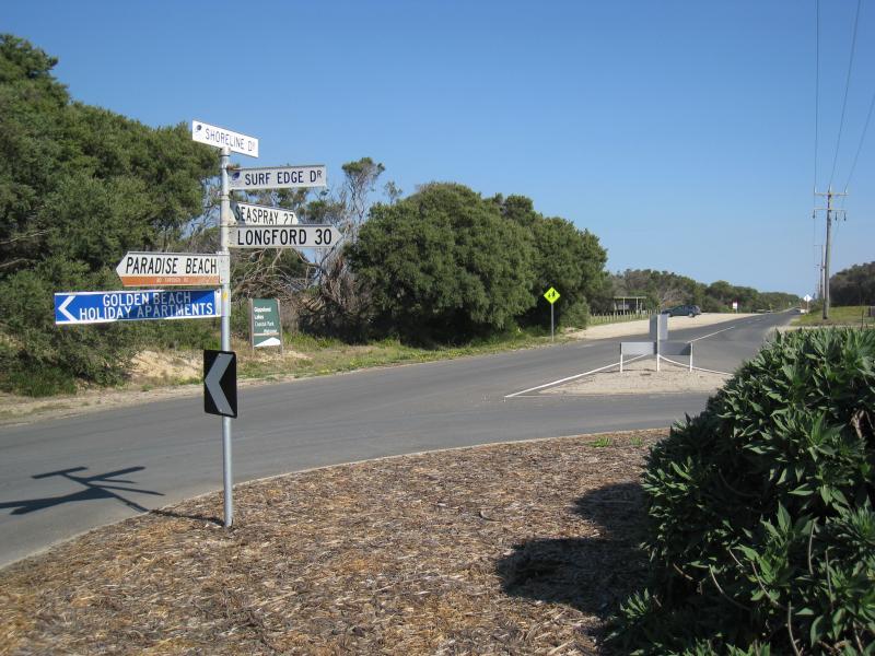 Golden Beach - Town centre on Surf Edge Drive: View south-west along Shoreline Dr at Surf Edge Dr