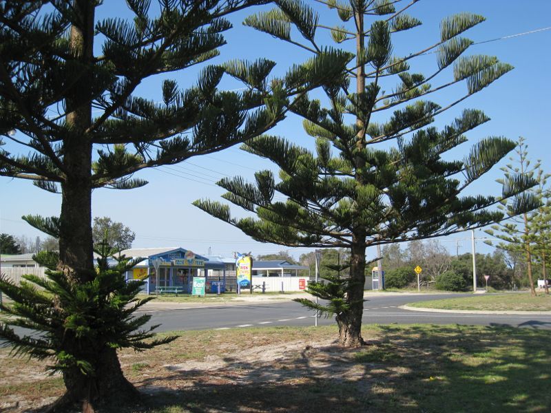 Golden Beach - Town centre on Surf Edge Drive: View north-east across Surf Edge Dr towards Blue Water Av