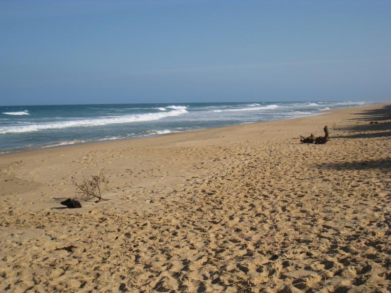Golden Beach - Paradise Beach township, camping area on The Boulevard near 30th Street: View south-west along beach