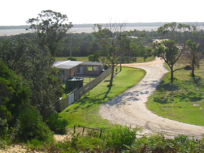 Golden Beach - Paradise Beach township, entrance to Gippsland Lakes Coastal Park: View north-west towards Lake Reeve from lookout at southern end of Government Rd
