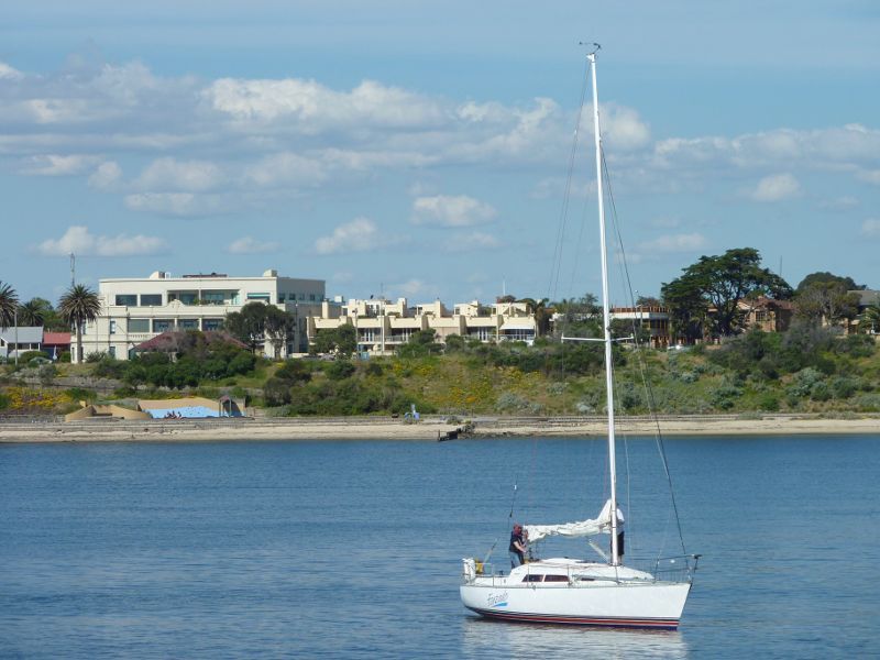 Hampton - Beach and coastline around B.J. Ferdinando Gardens: View across bay towards coast