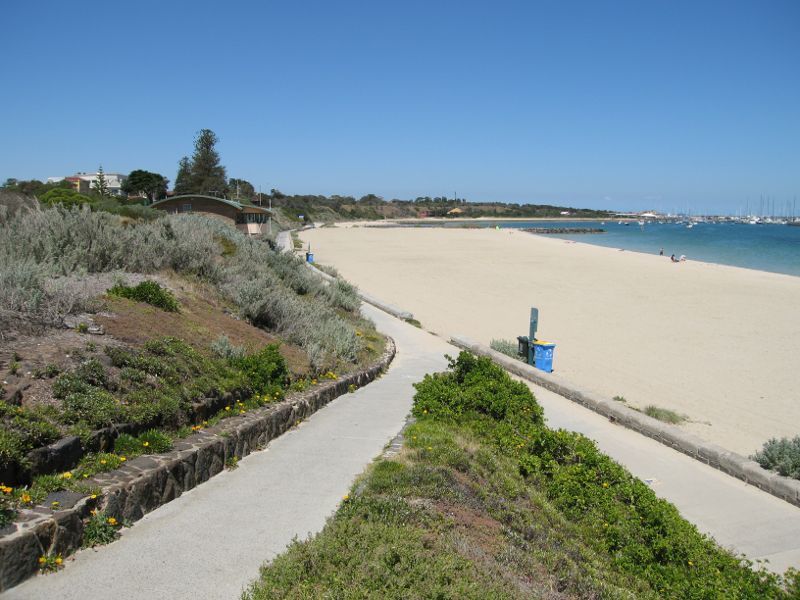 Hampton - Beach and coastline north of Hampton Lifesaving Club: South-easterly view along beach towards Hampton Lifesaving Club