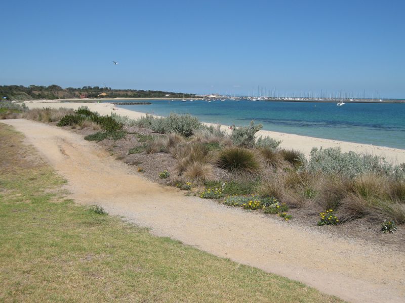 Hampton - Beach and coastline north of Hampton Lifesaving Club: South-easterly view along coastal path