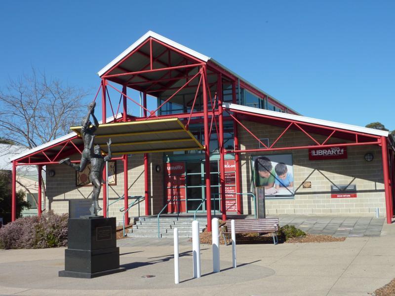 Hastings - Commercial centre and shops, High Street precinct: Library and John Coleman statue, corner High St and Salmon St