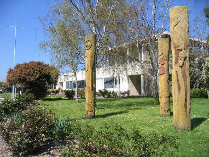 Hastings - Marine Parade: Wood carvings in posts, Mornington Peninsula Shire Council offices, corner Marine Pde and High St